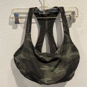Athleta sports bra. Camouflage design. Cute back. Moderate support. Size XL